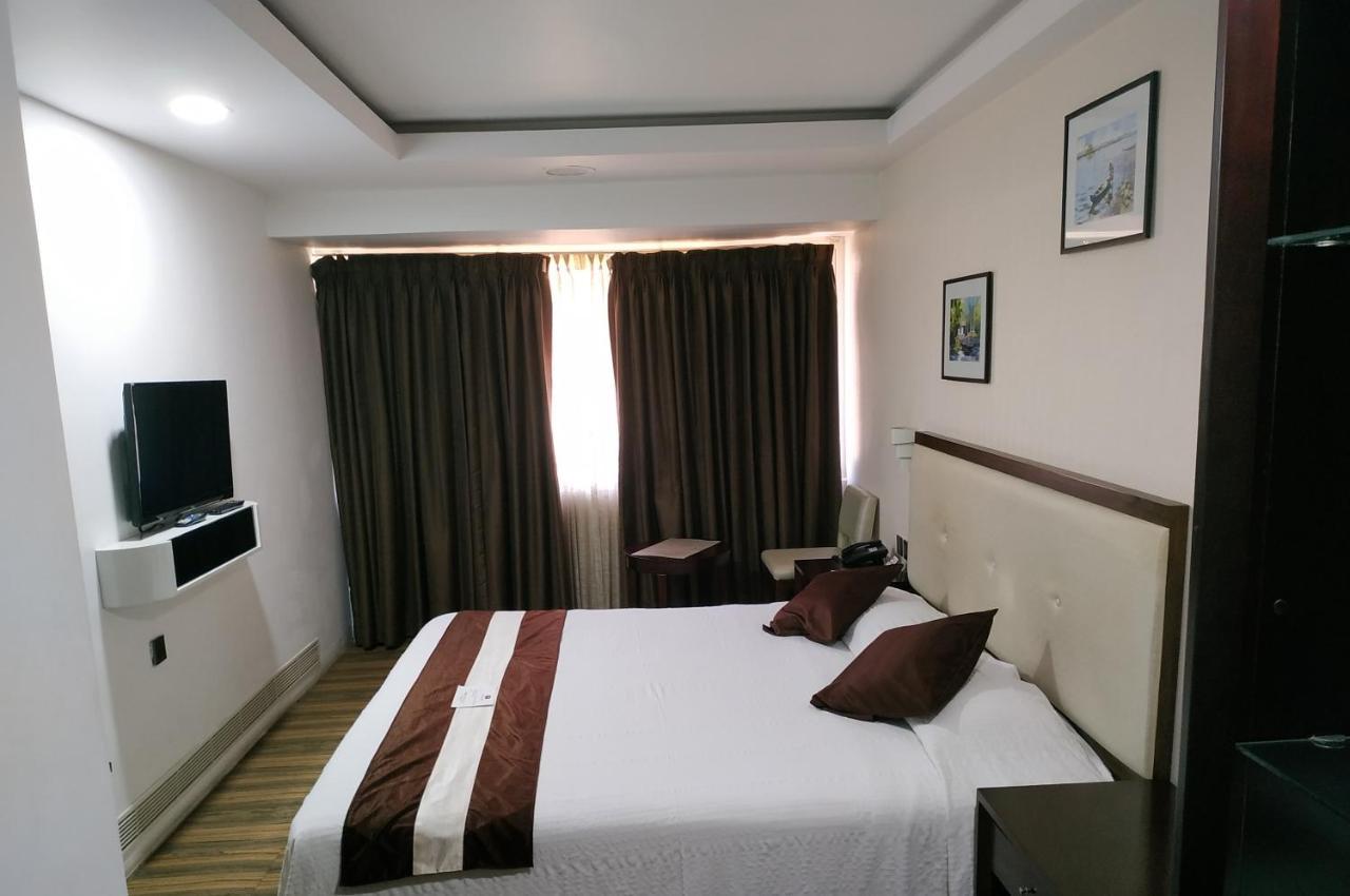 Kga Elite Continental Hotel Tiruvalla Exteriör bild